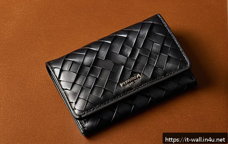보테가 베네타의 카드홀더와 미니 지갑 비교 - A luxurious Bottega Veneta cardholder and mini wallet displayed on a polished wooden surface, showca...